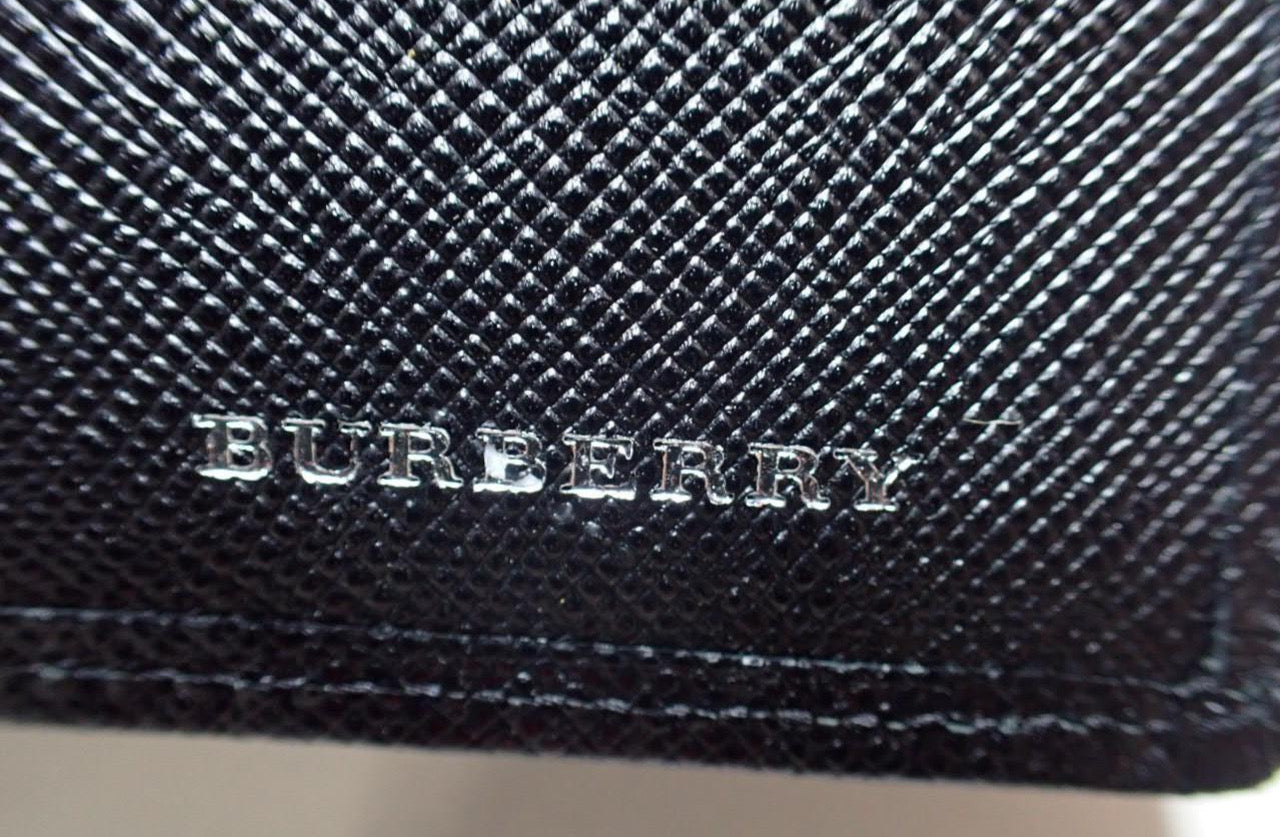 Burberry Embossed Check Continental Wallet