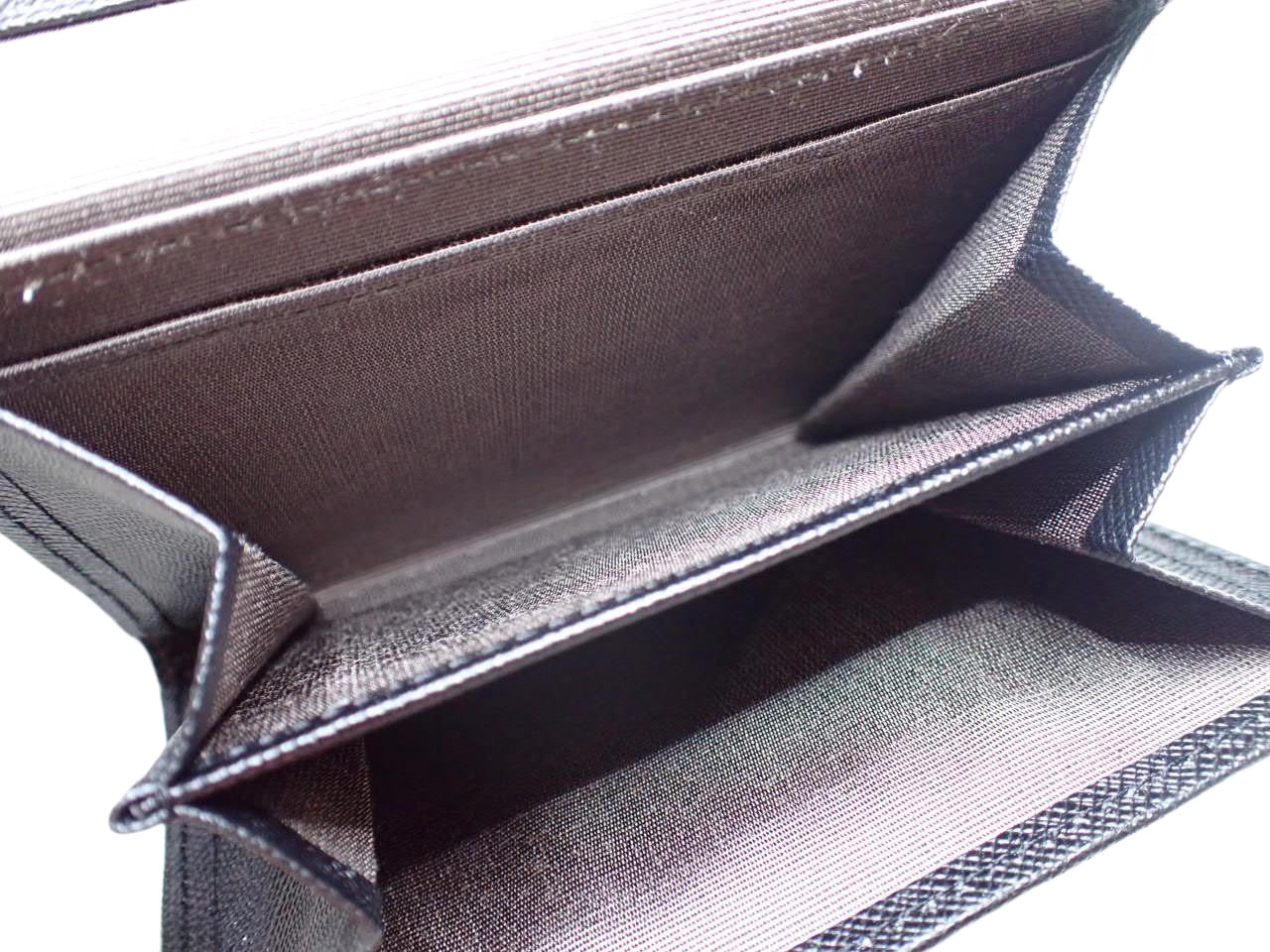 Burberry Embossed Check Continental Wallet