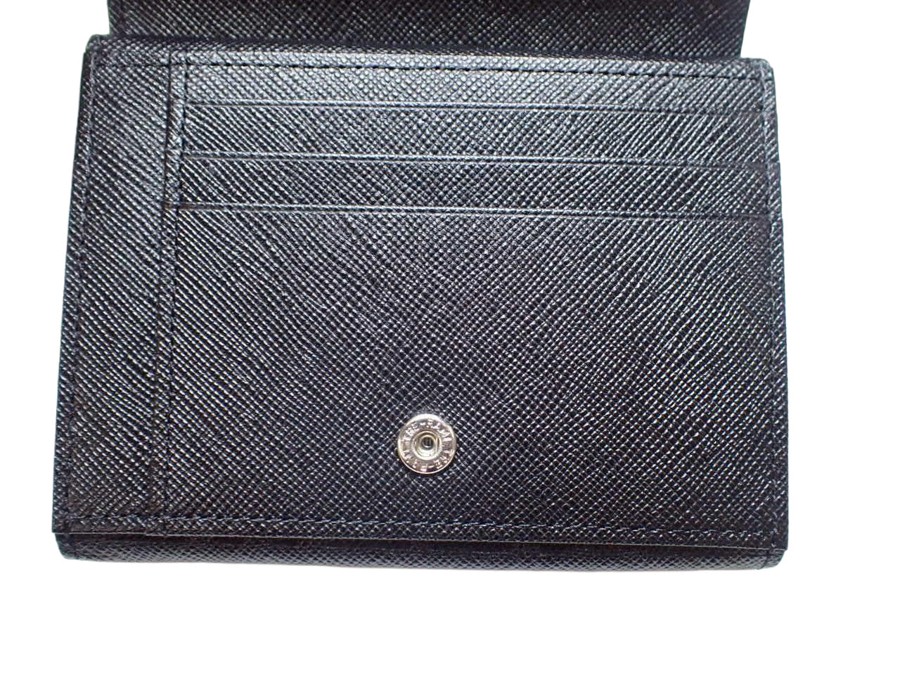 Burberry Embossed Check Continental Wallet
